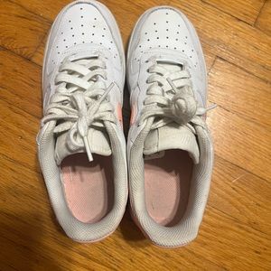 Nike air force with pink accents. Good condition. Worn just a couple times.
